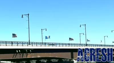 Acrisure / Fischer Rounds Real Estate sponsors the Flags Across the Bridge in Observance of 250th Independence Day